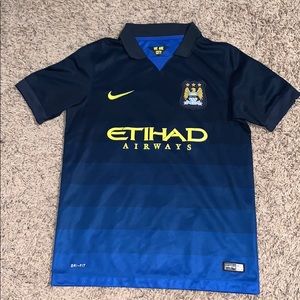 Nike Dri-Fit Manchester City team jersey.